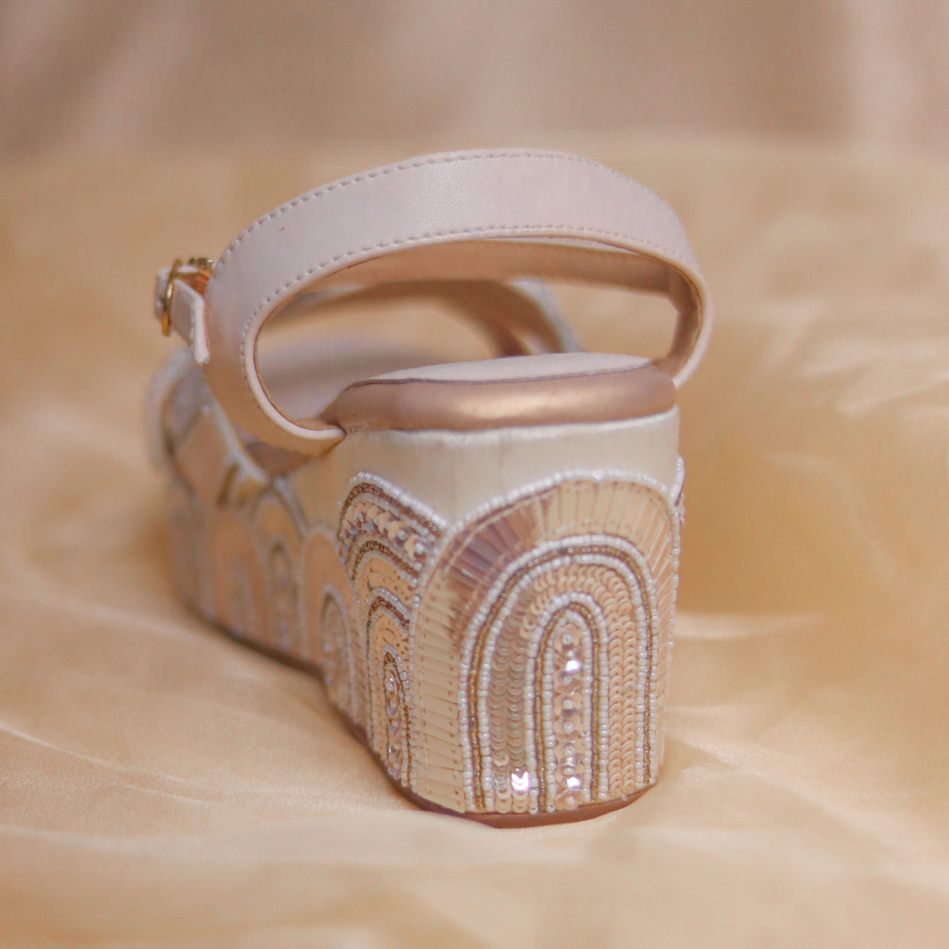 Ivory wedding wedges with handcrafted shimmer and pearl embellishments