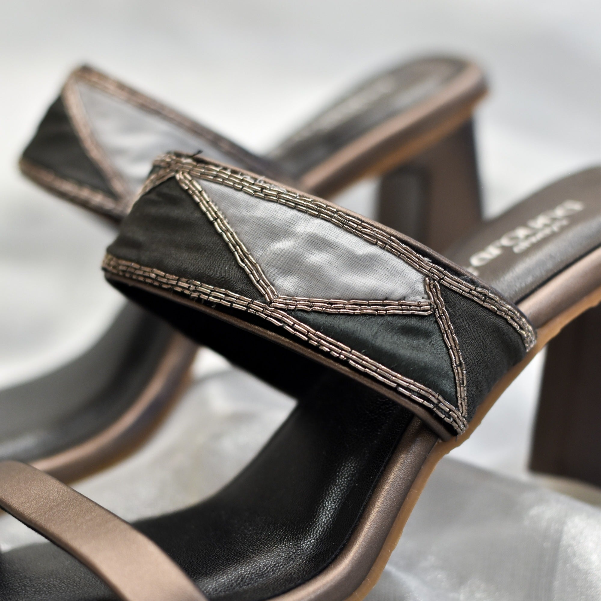 Patchwork slip-on sandals with black and grey fabric strap for festive outfits
