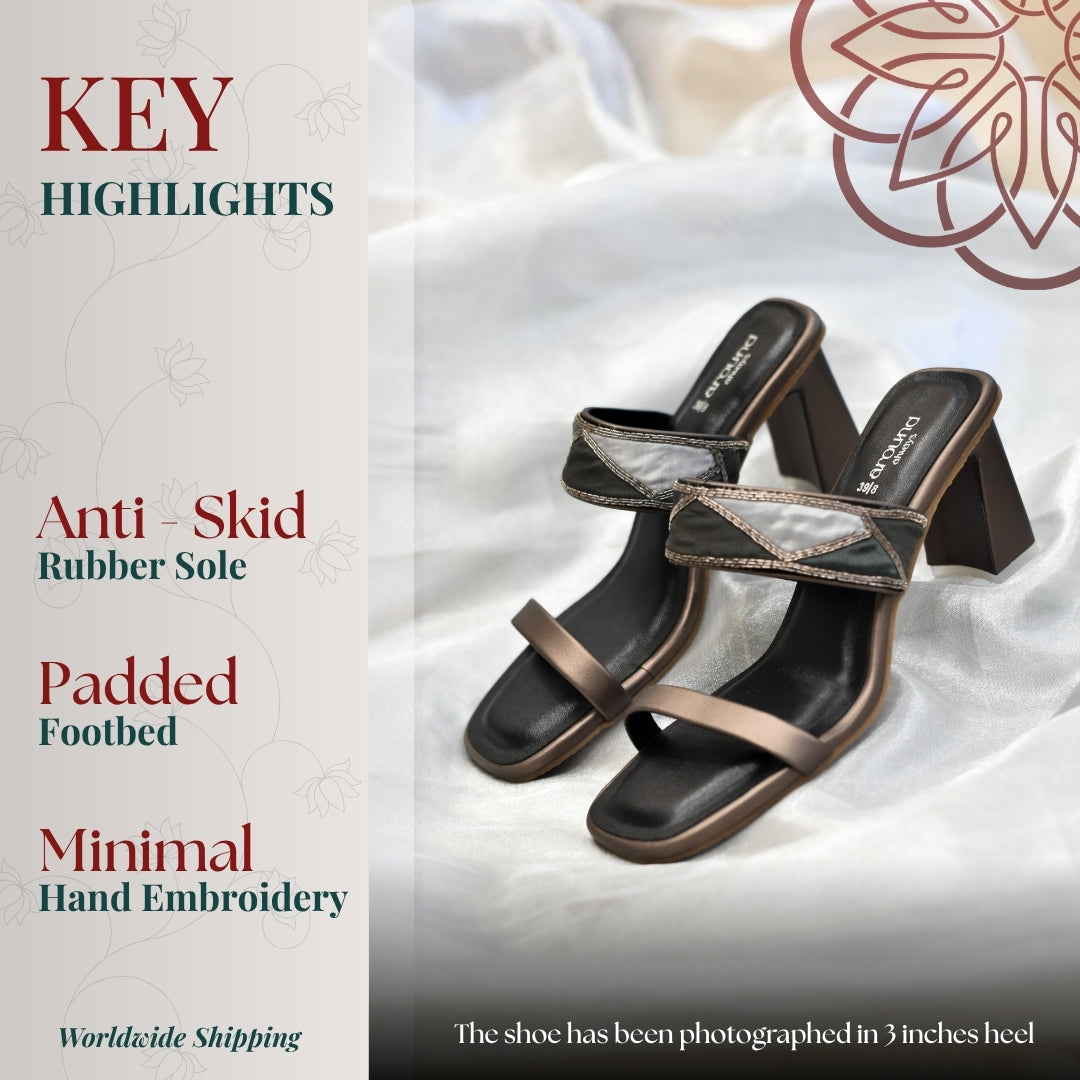 Dual tone black and grey heeled sandals with structured straps and padded footbed