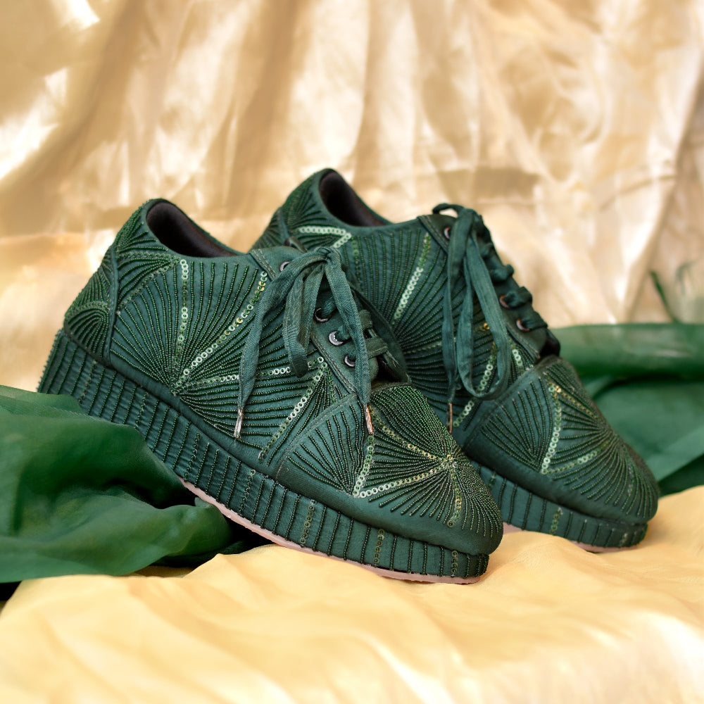 Emerald green festive sneakers with fan-shaped embroidery patterns

