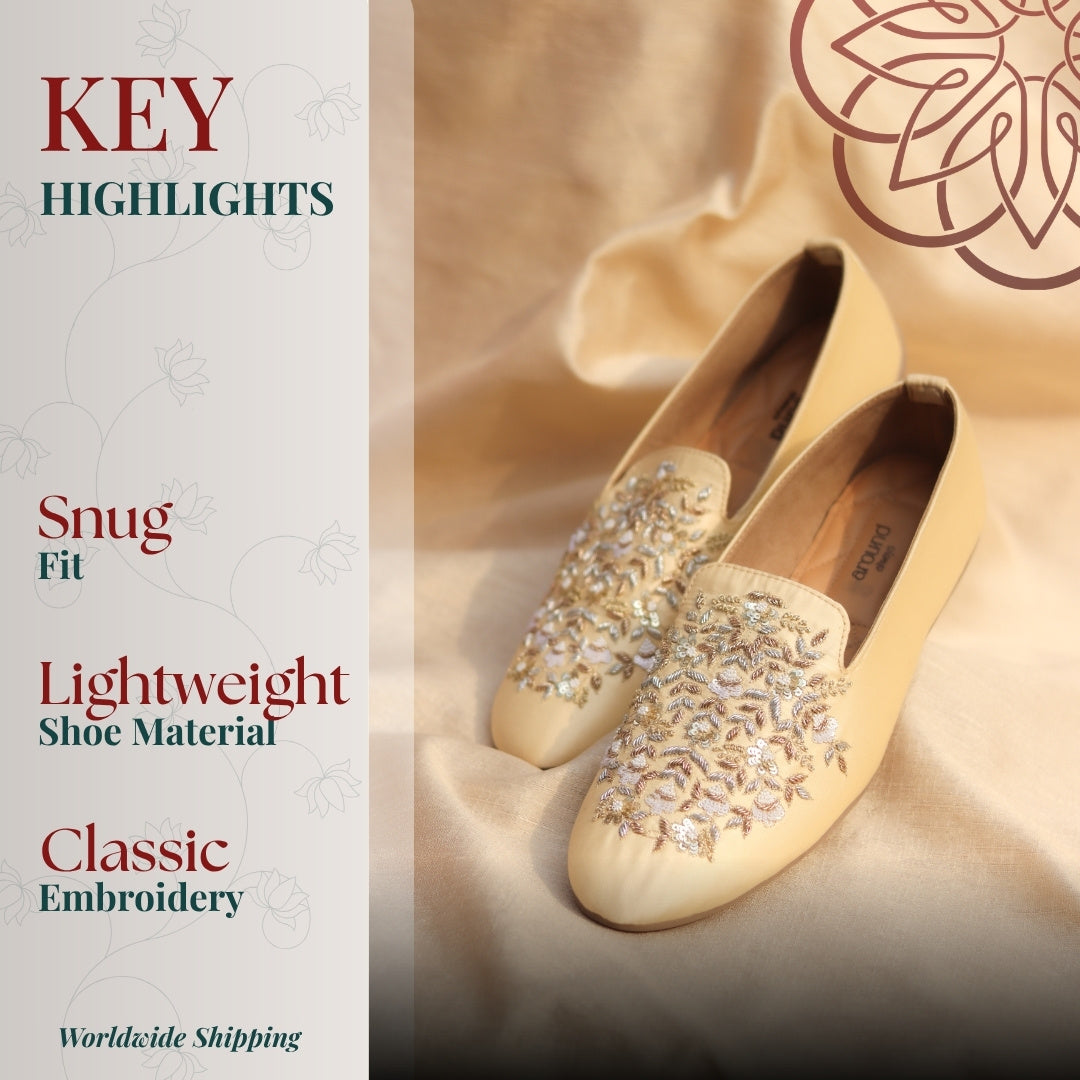 Beige embellished  loafers with intricate flower thread work