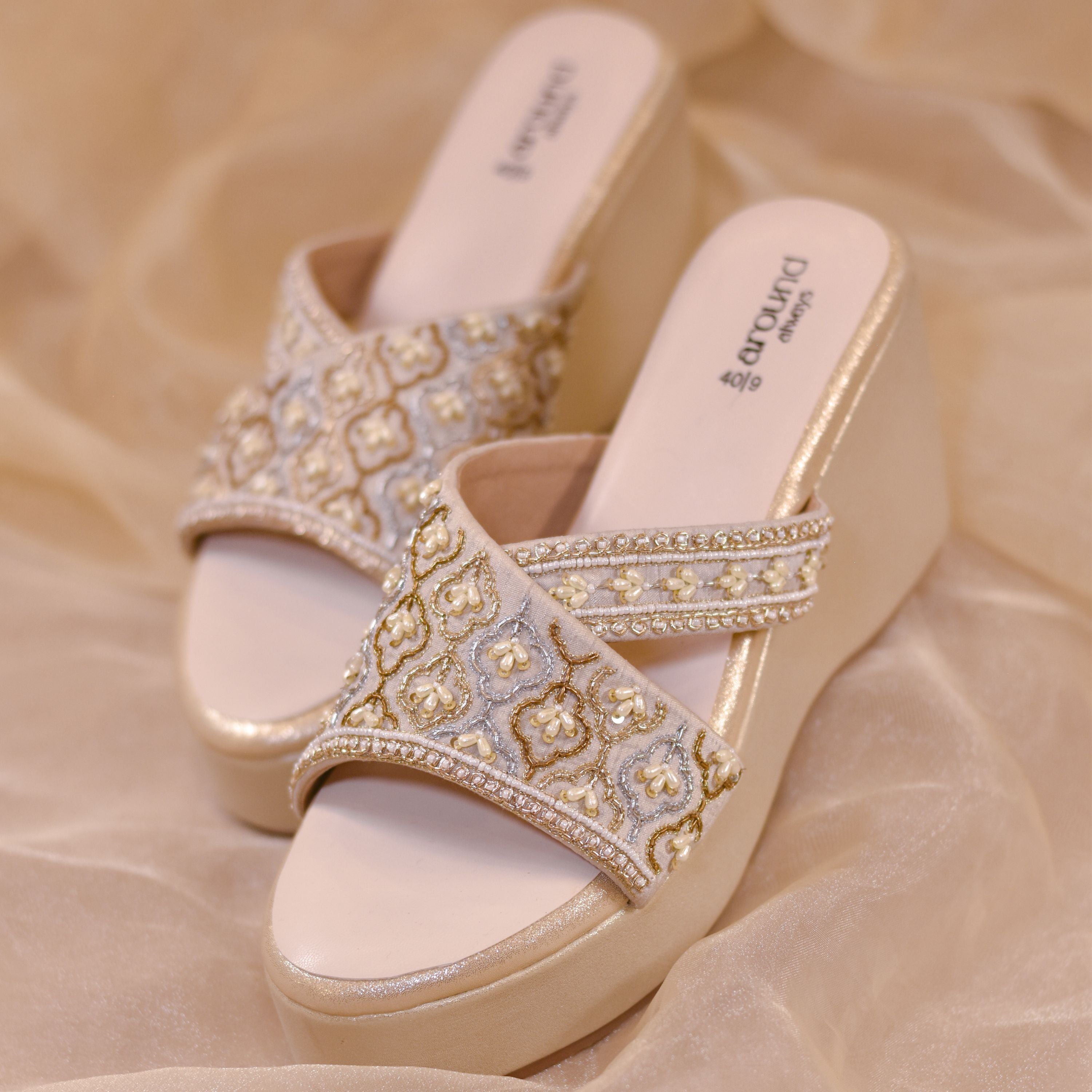 Champagne-toned wedge with soft cushioned footbed
