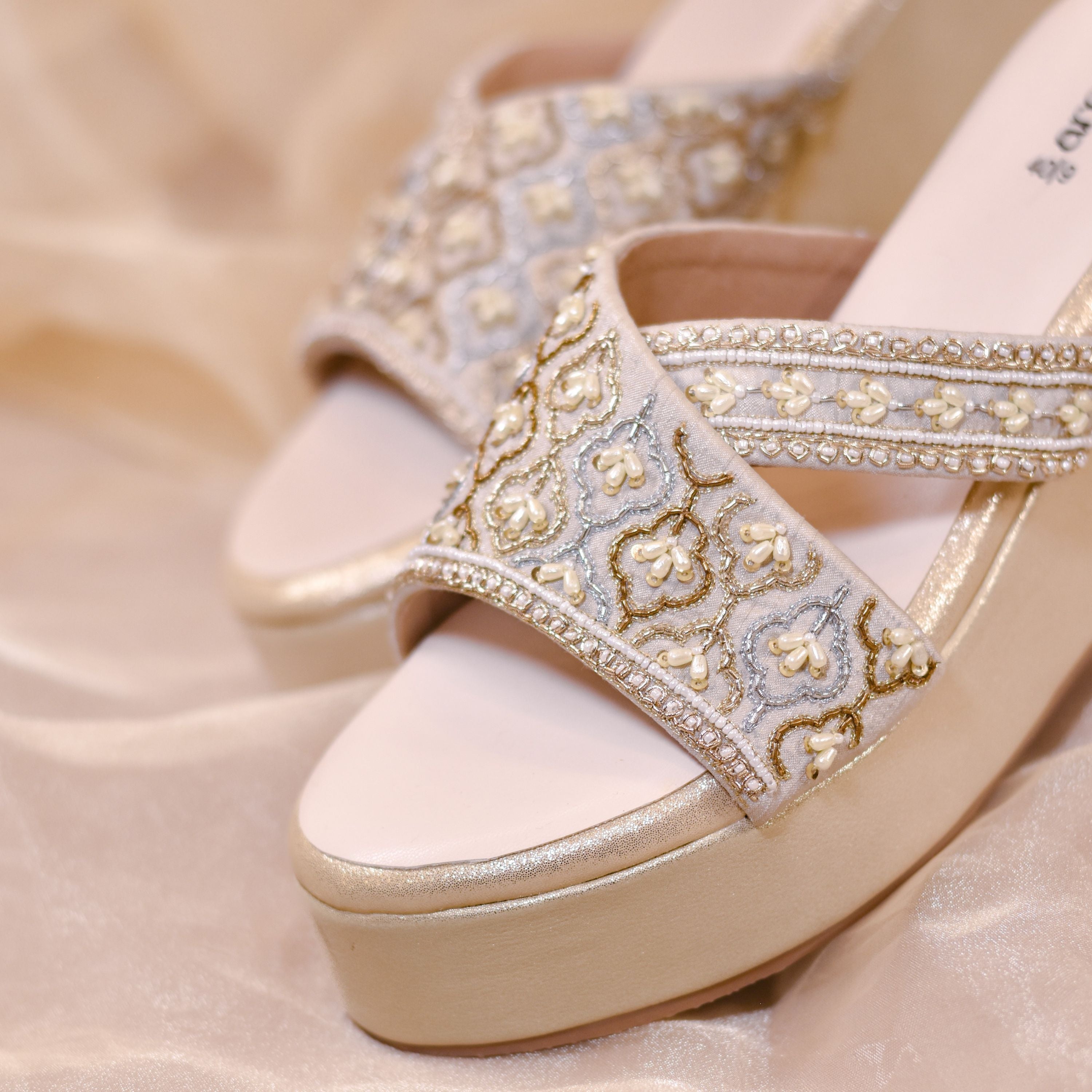 Occasion ready wedges with minimal hand embroidery