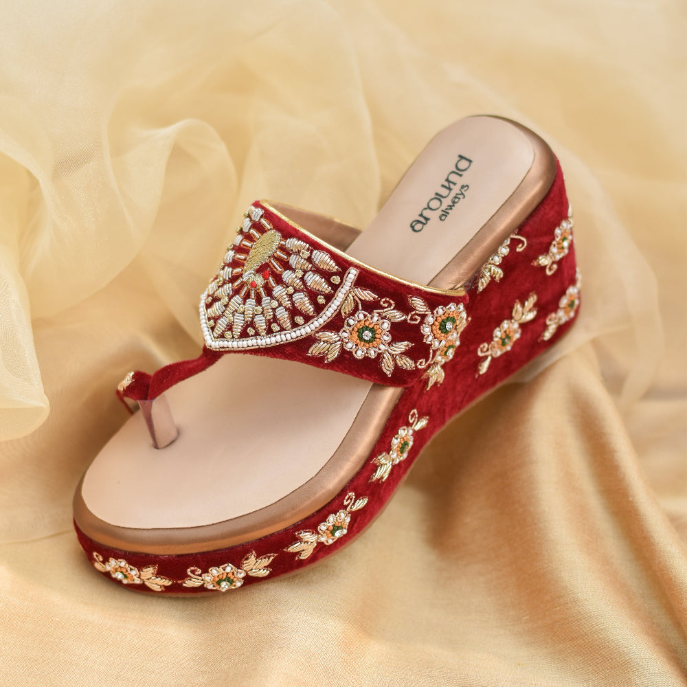 Indian wedding wedges in deep red with hand-done embroidery