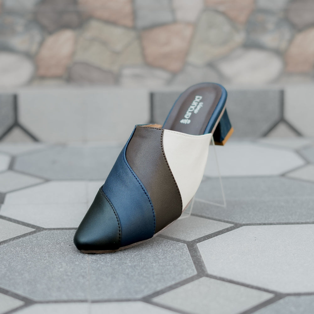 Contemporary mule in blue, grey, and cream tones with sculpted heel