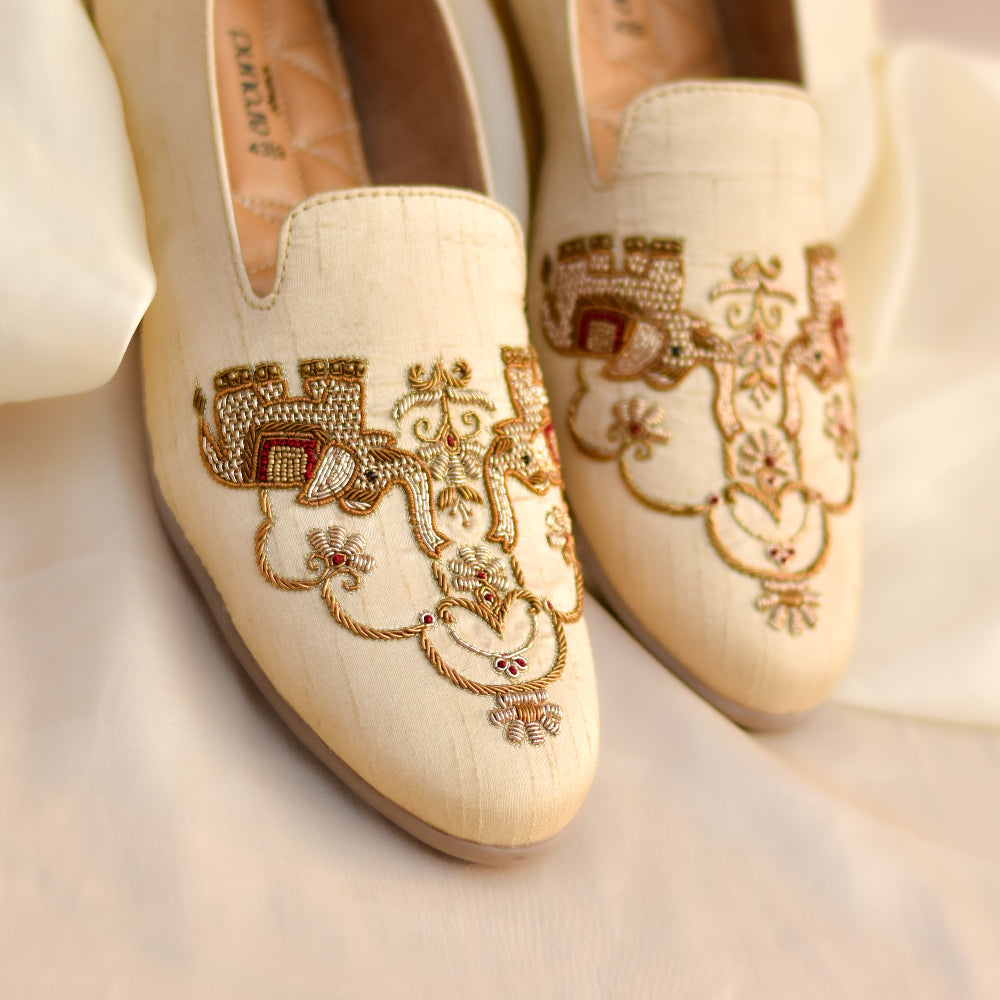 Beige loafers with cushioned footbed and intricate gold embroidered detailing perfect fit for wedding day