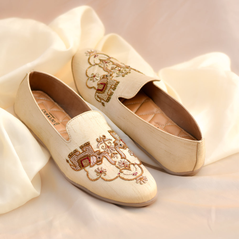 Handcrafted ethnic loafer with elephant motif and fine surface detailing
