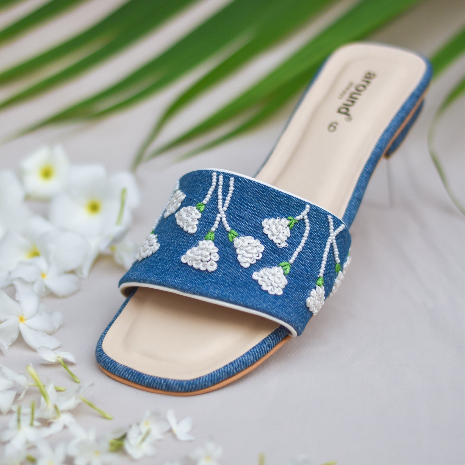 Hand embroidered denim slipons for girls with white embroidery