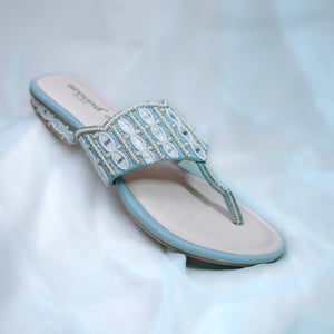 Powder blue  sandals with white thread embroidery and mirror work detailing
