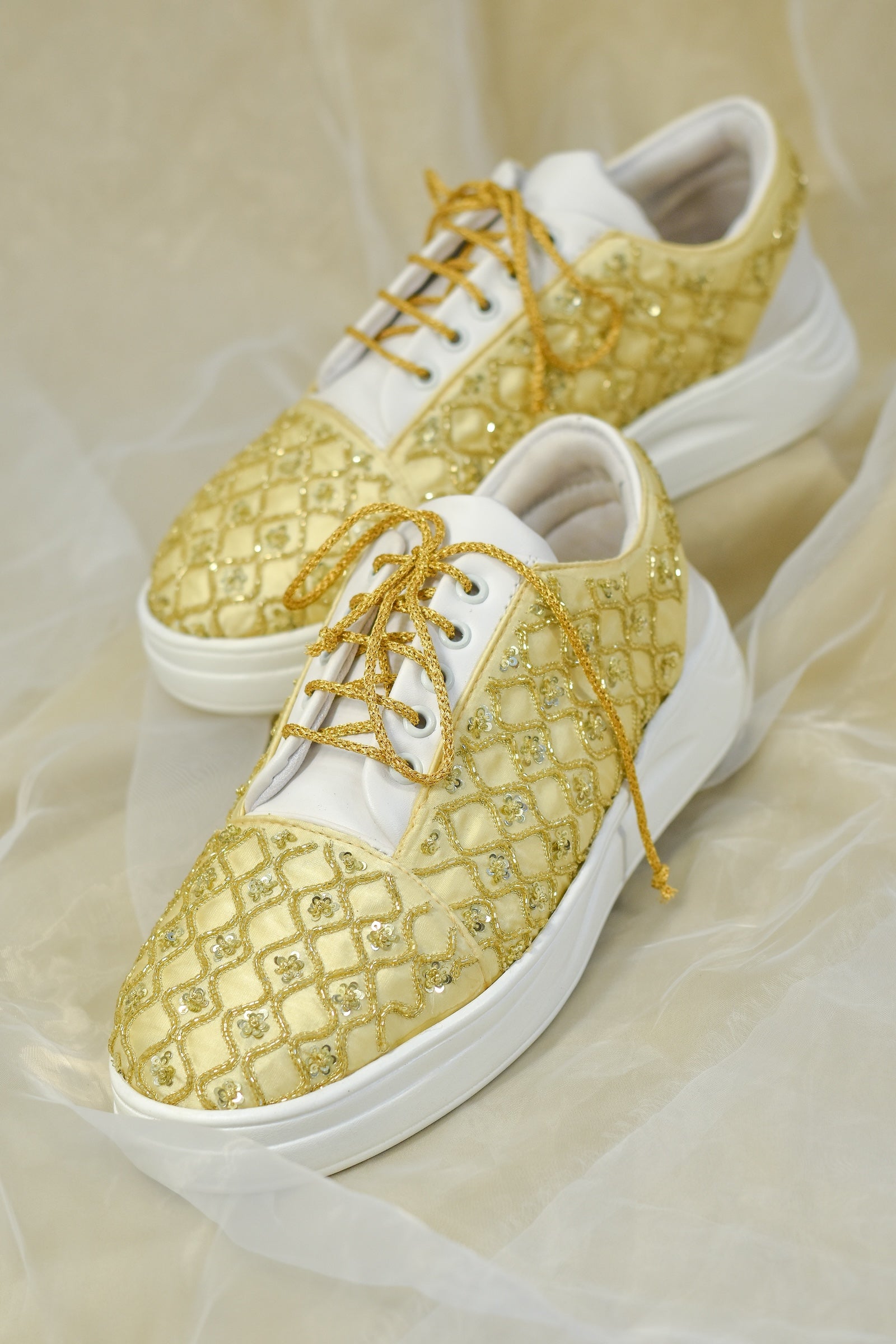 Sequins and beads embroidered sneakers from India