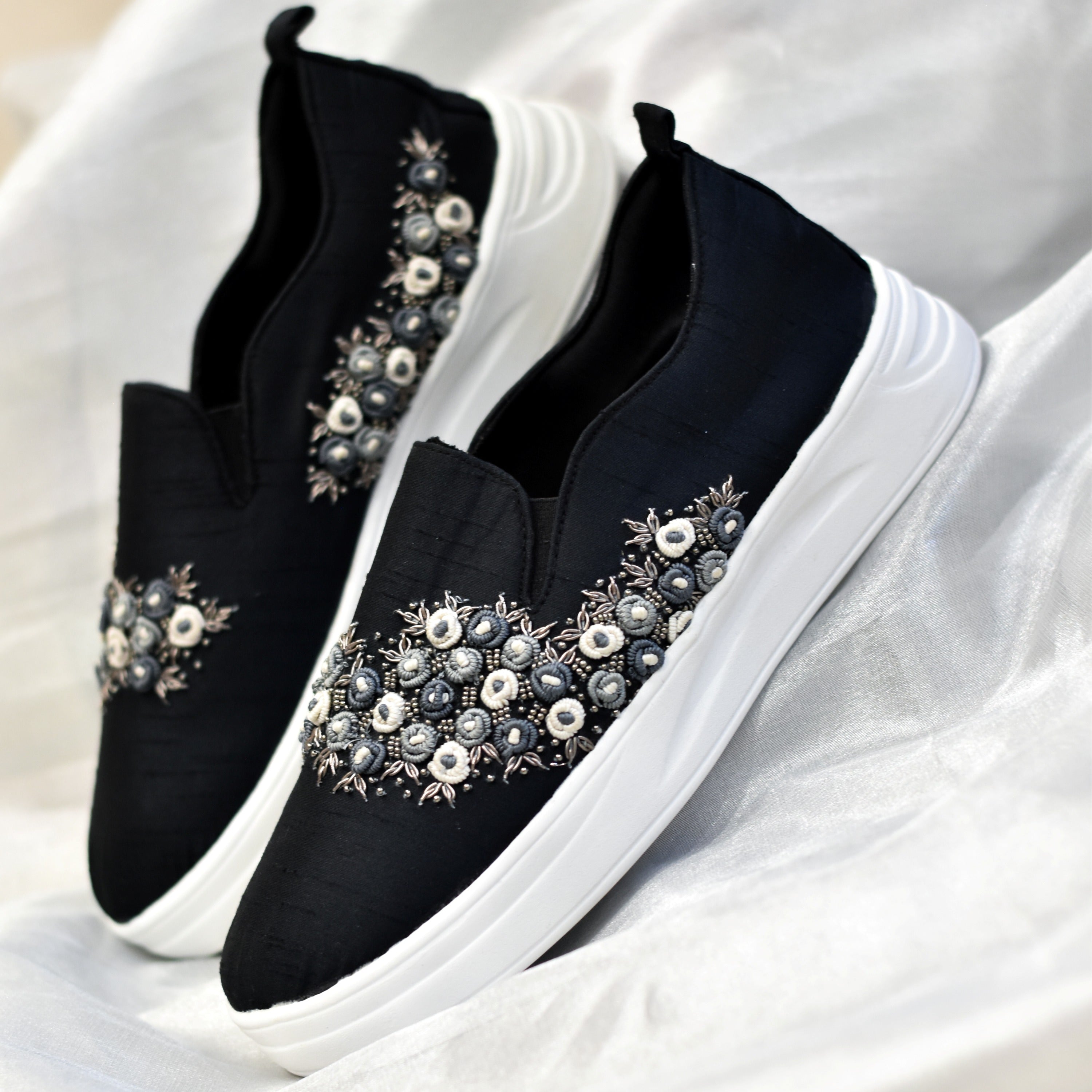 Black cushioned wide-fit ethnic sneakers for Indian women to wear under lehenga and sarees