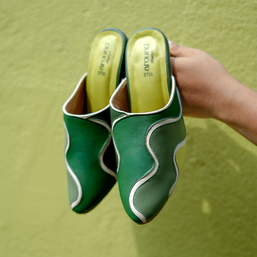 Green mule heels with colour-block wave detailing and sculpted block heel
