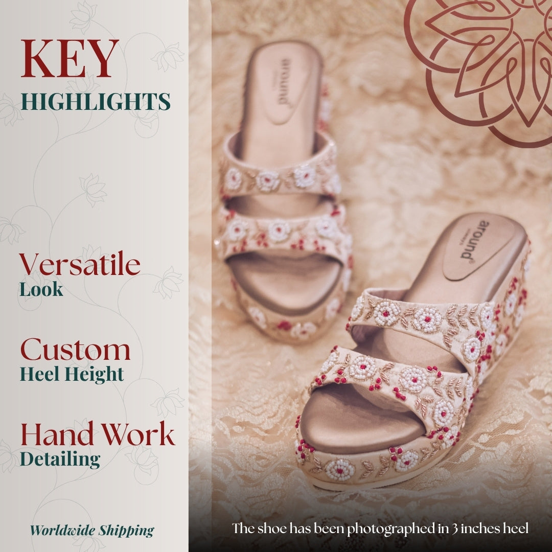 Elegant embroidered platform sandal with floral motifs and cushioned sole