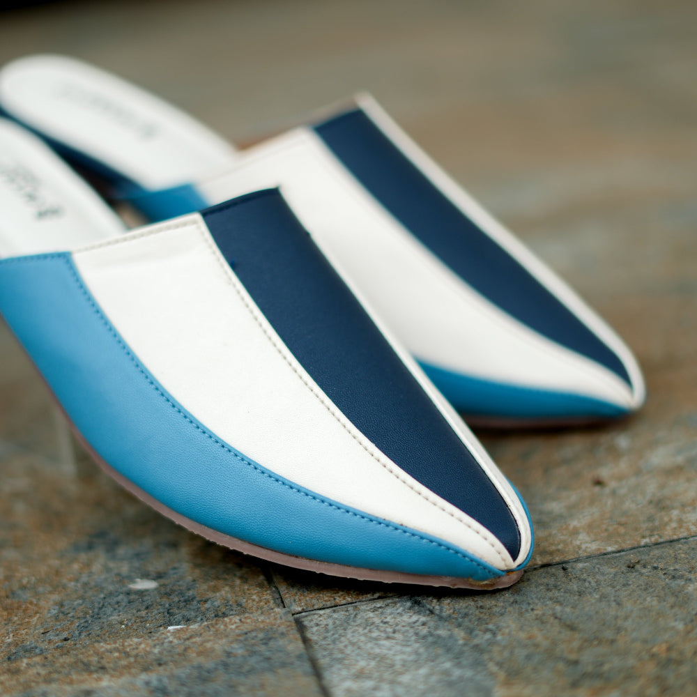Navy, sky blue, and white mule with pointed toe styling
