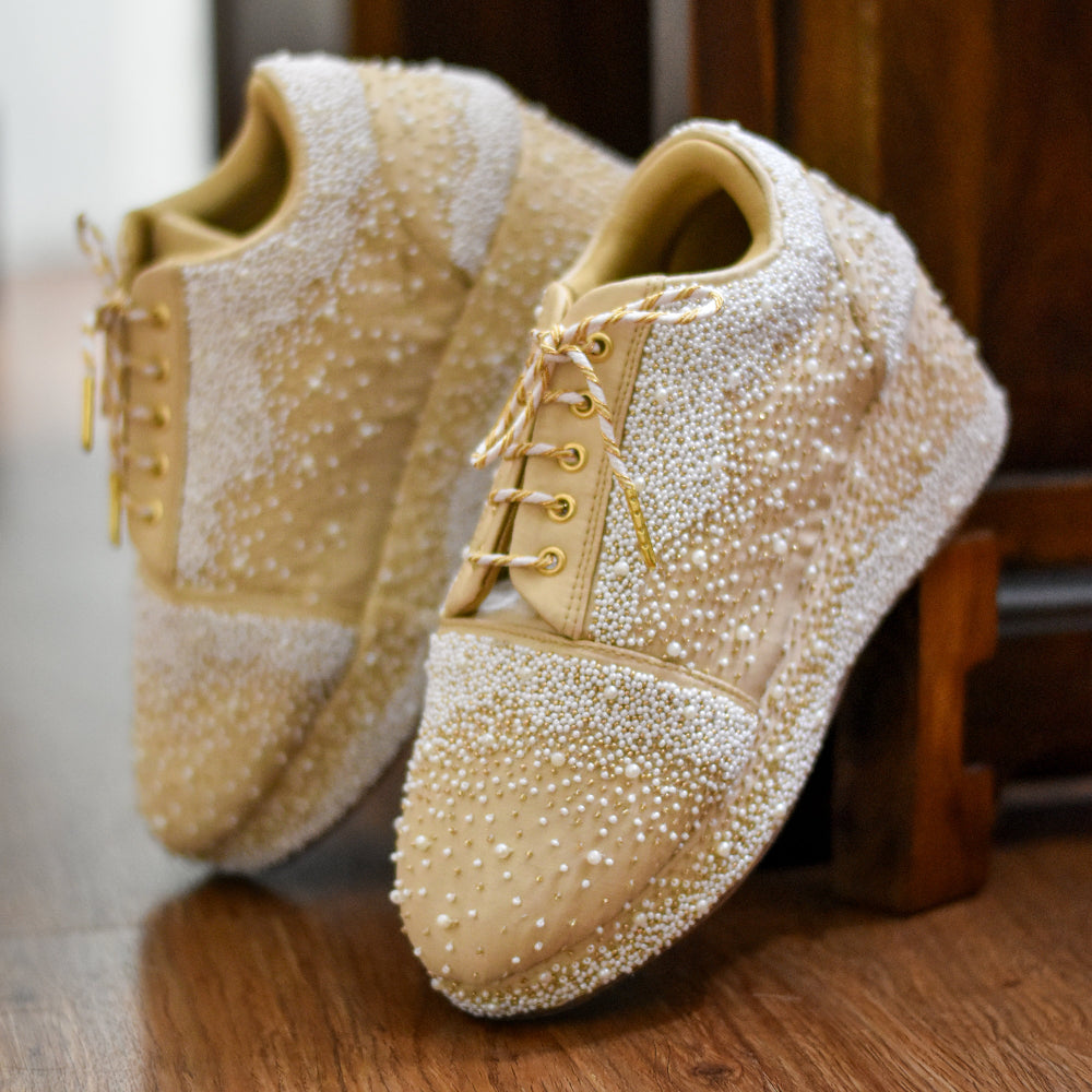 Elegant bridal sneaker wedges with pearl embellishments for weddings