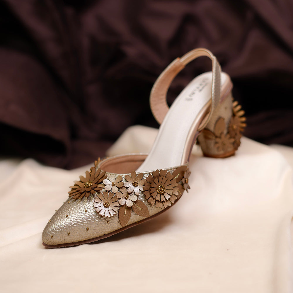 Metallic pointed-toe mules with 3D floral embellishments
