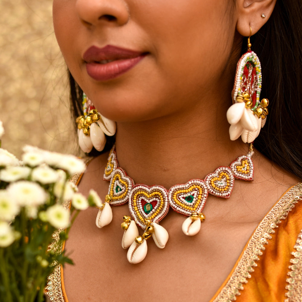 Heart choker set with quirky earrings and cowrie hanging