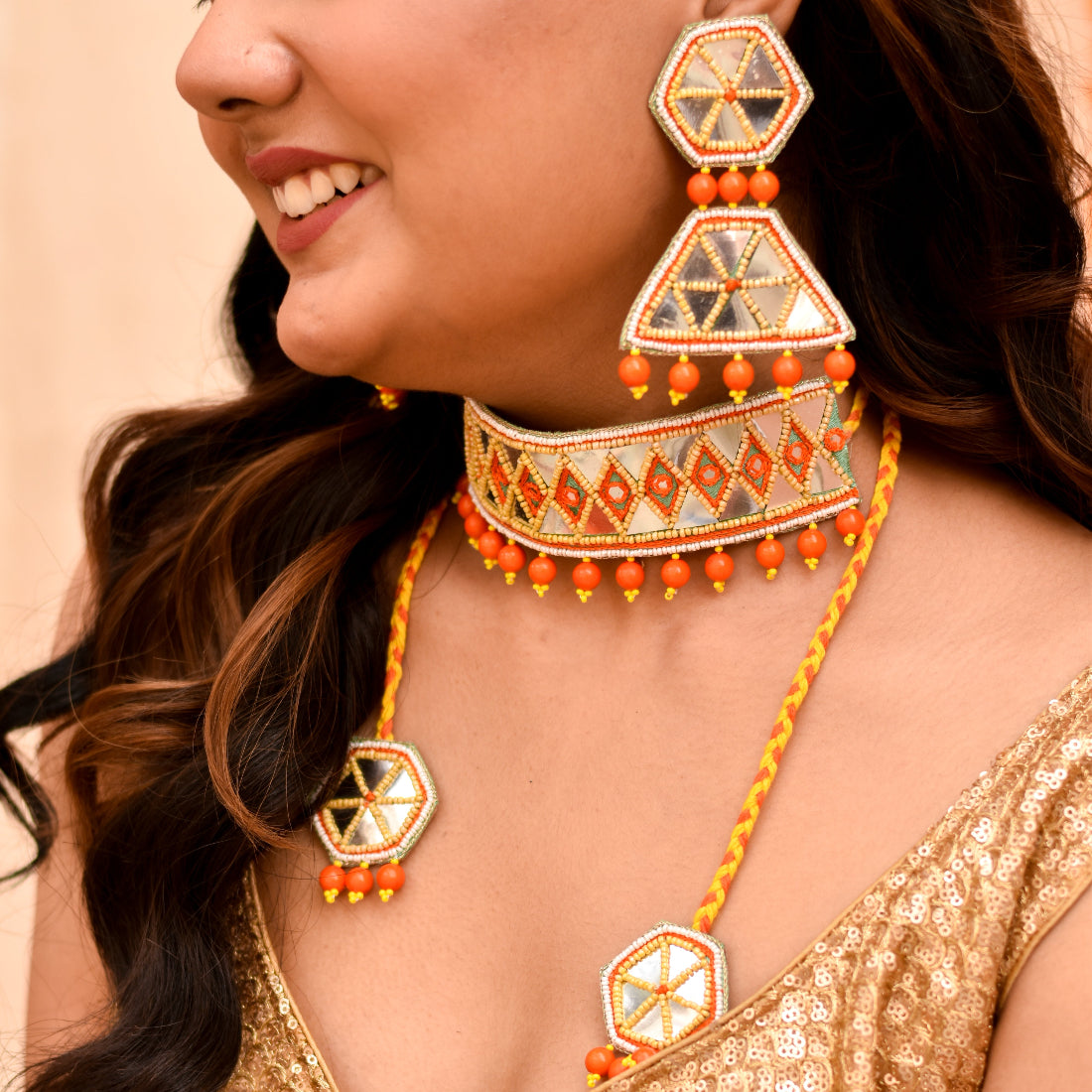 Orange and yellow handmade imitation jewellery for bridal haldi mehendi look