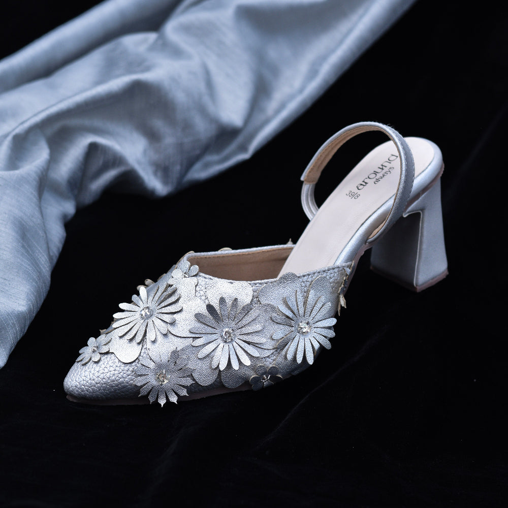 Metallic heels with dimensional floral appliqués and block heel
