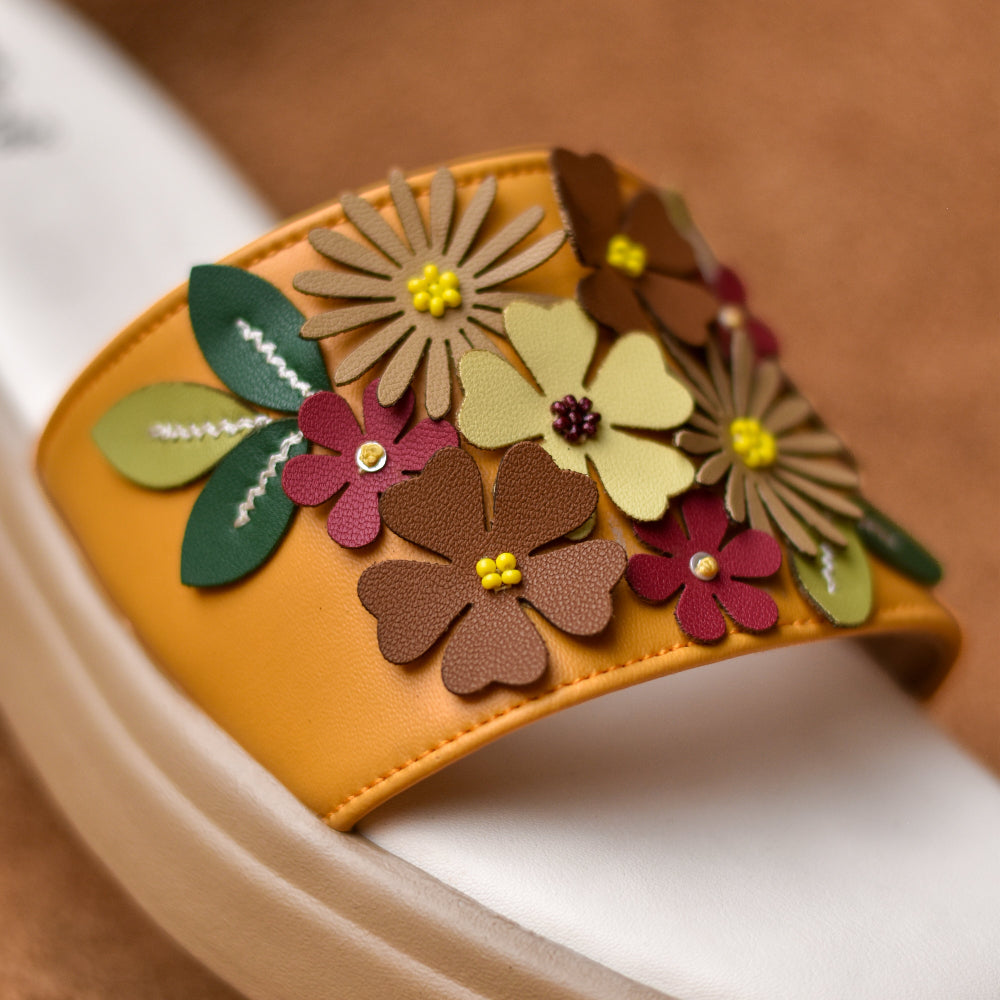 Casual platform slides with handcrafted floral detailing in earthy tones