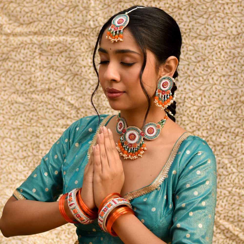 Wedding function jewellery set with colourful handcrafted details