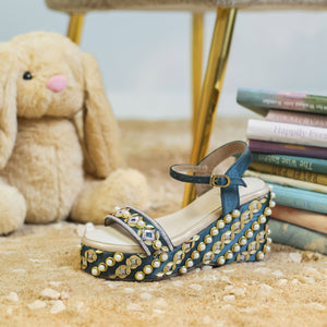 Designer platform heels in teal colours with high heel option and ankle strap for support
