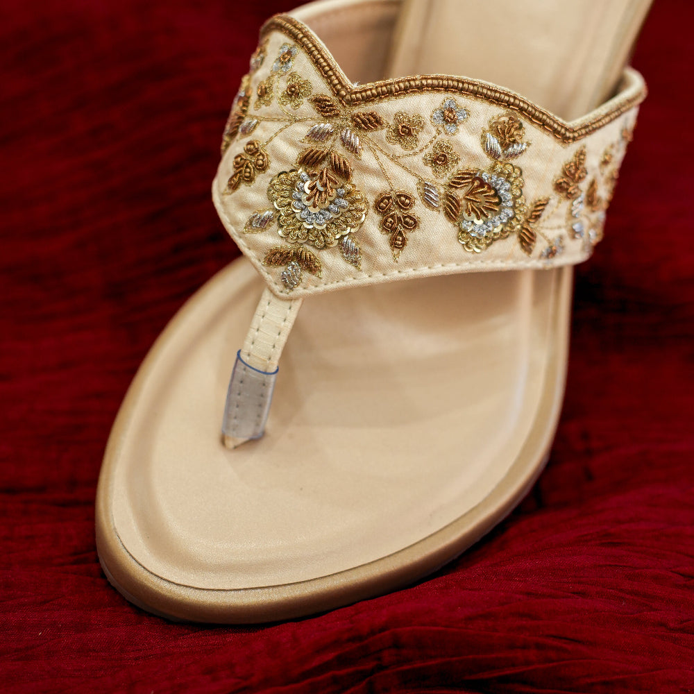 Floral embellished champagne toe-ring footwear by Around Always
