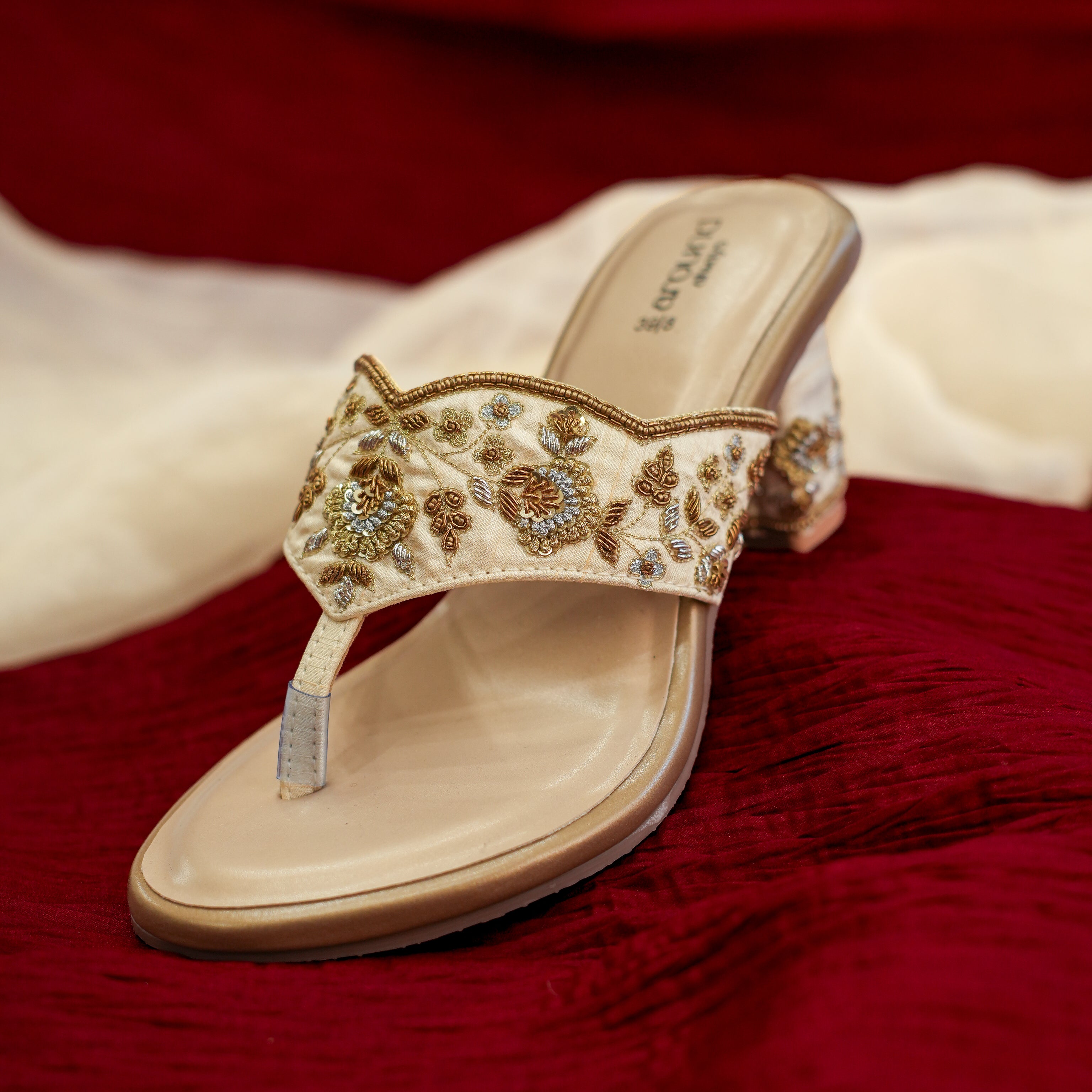Champagne ivory embroidered toe-ring mule with floral detailing
