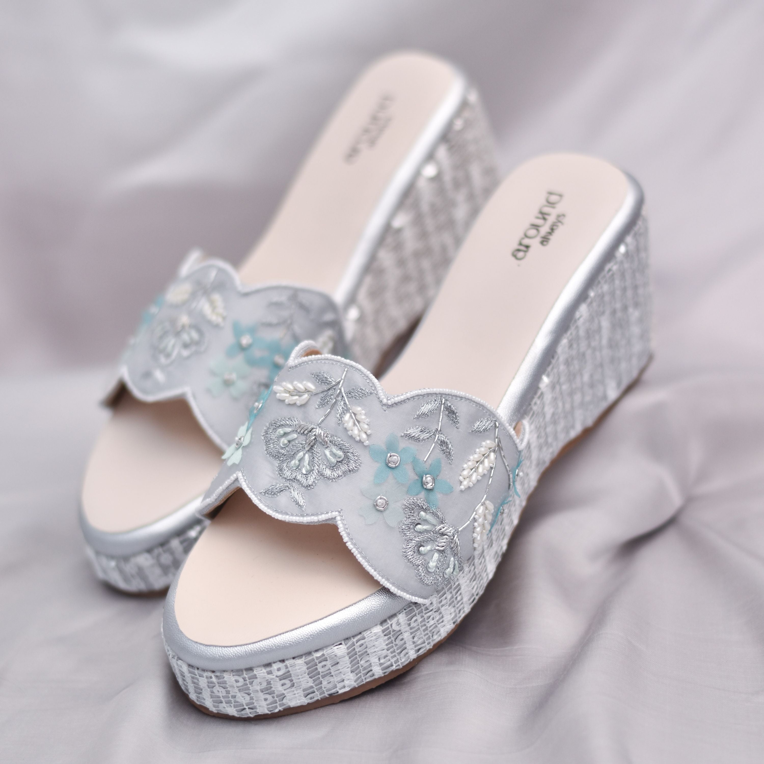 Scalloped strap wedge with aqua flowers and zardozi detailing