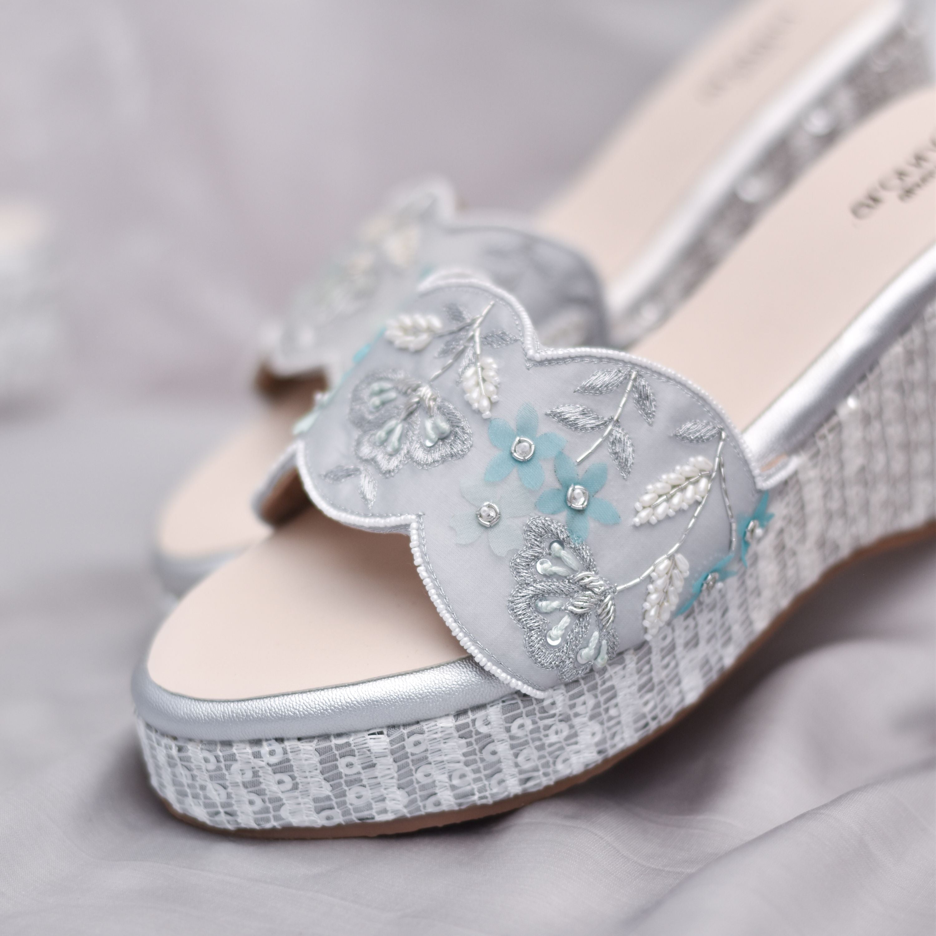 3D petal embroidery for festivals with textured silver base