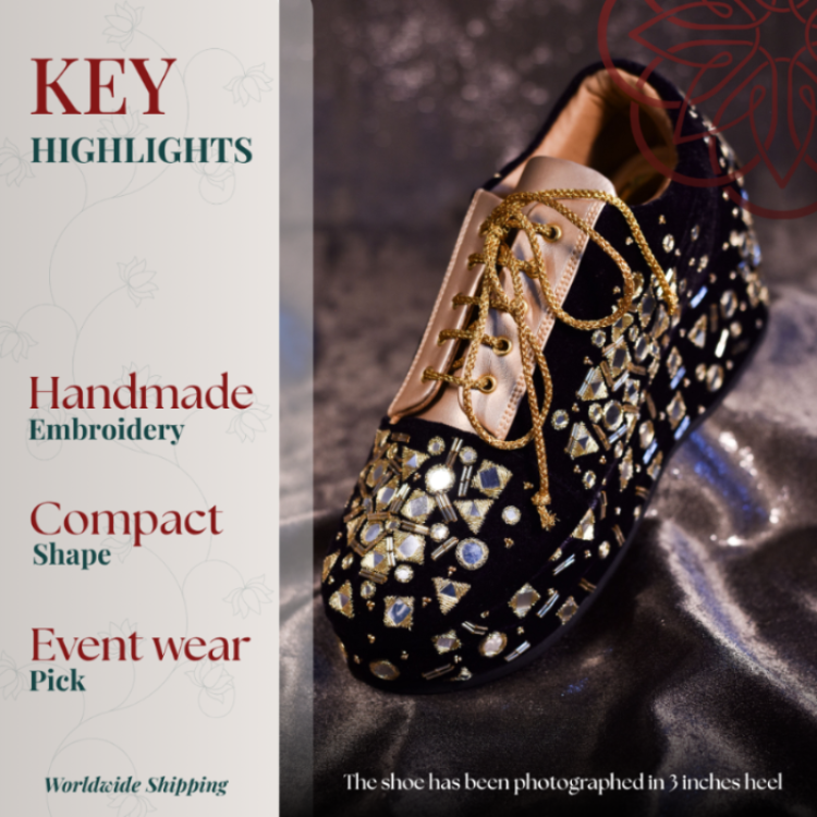 Black embellished sneaker with mirror work, gold lace-up detail, and cushioned base for stylish event wear and easy comfort