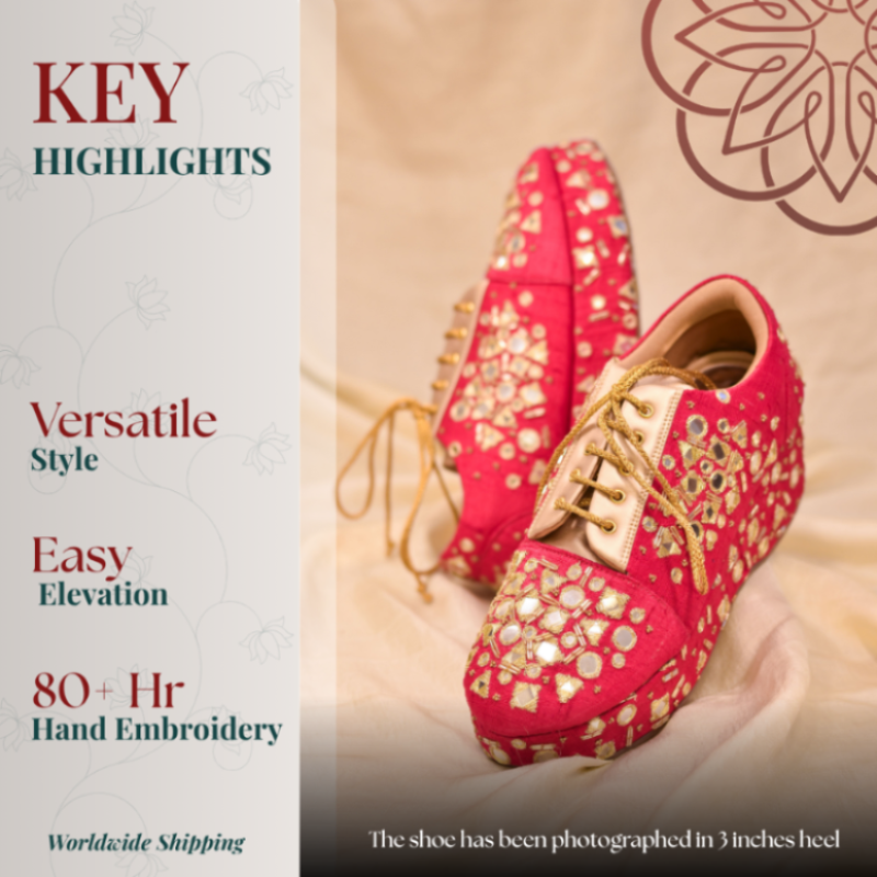 Bright pink embroidered wedge sneaker with mirror work, gold detailing, and lace-up elevated sole
