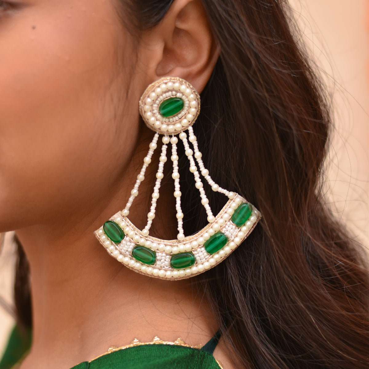 Pearl statement earrings for festive looks, parties, and celebrations.
