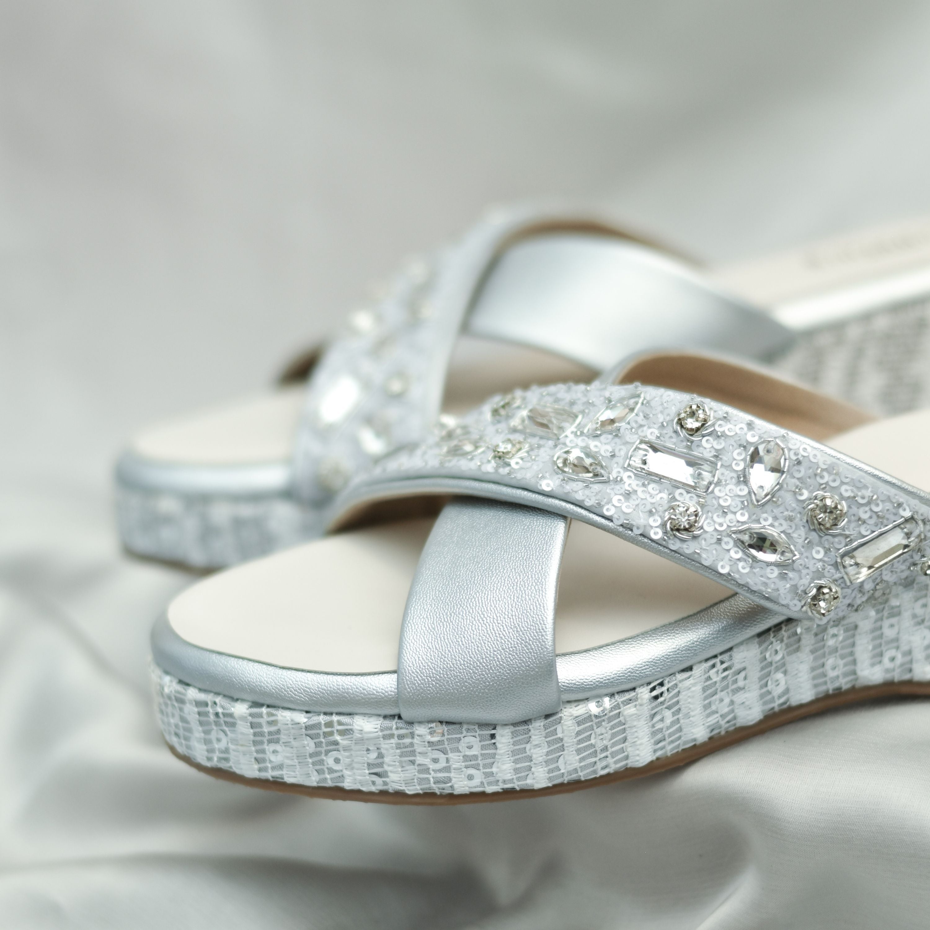 Silver slip-on festive pair with textured sole