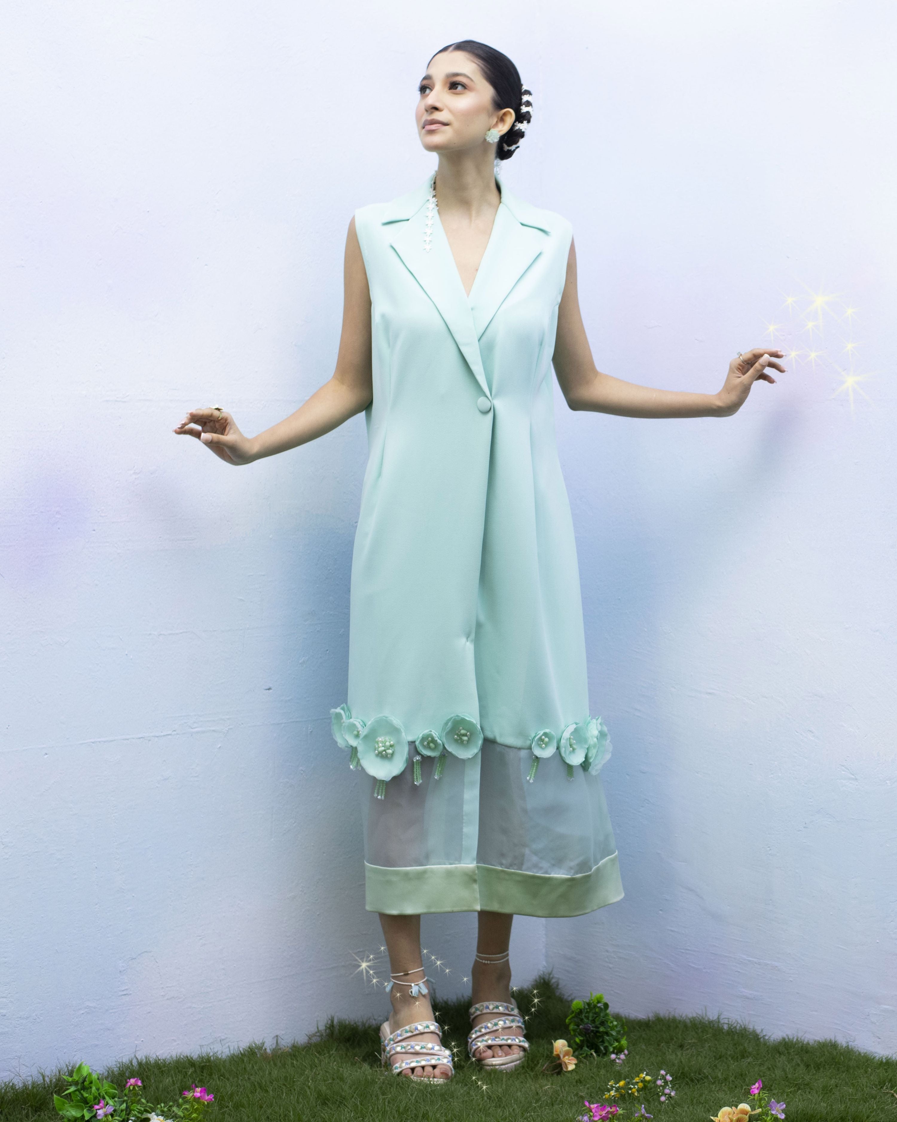 Open-toe wedges with textured straps and bold floral base