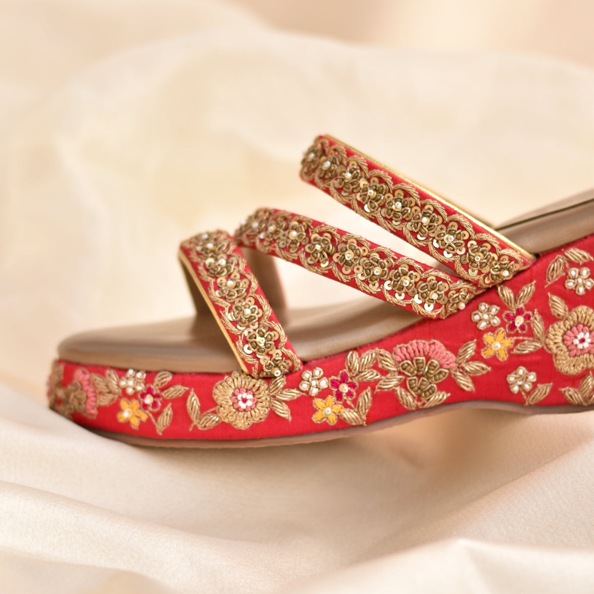 Red bridal heels with ethnic floral embroidery on thin slip on straps 