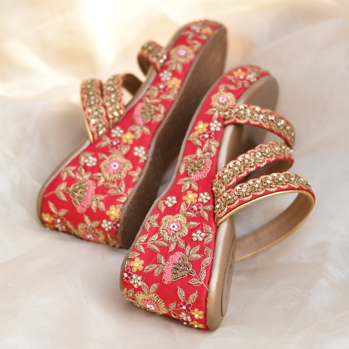 Red high-heeled wedges with floral embroidery and soft cushioned soles