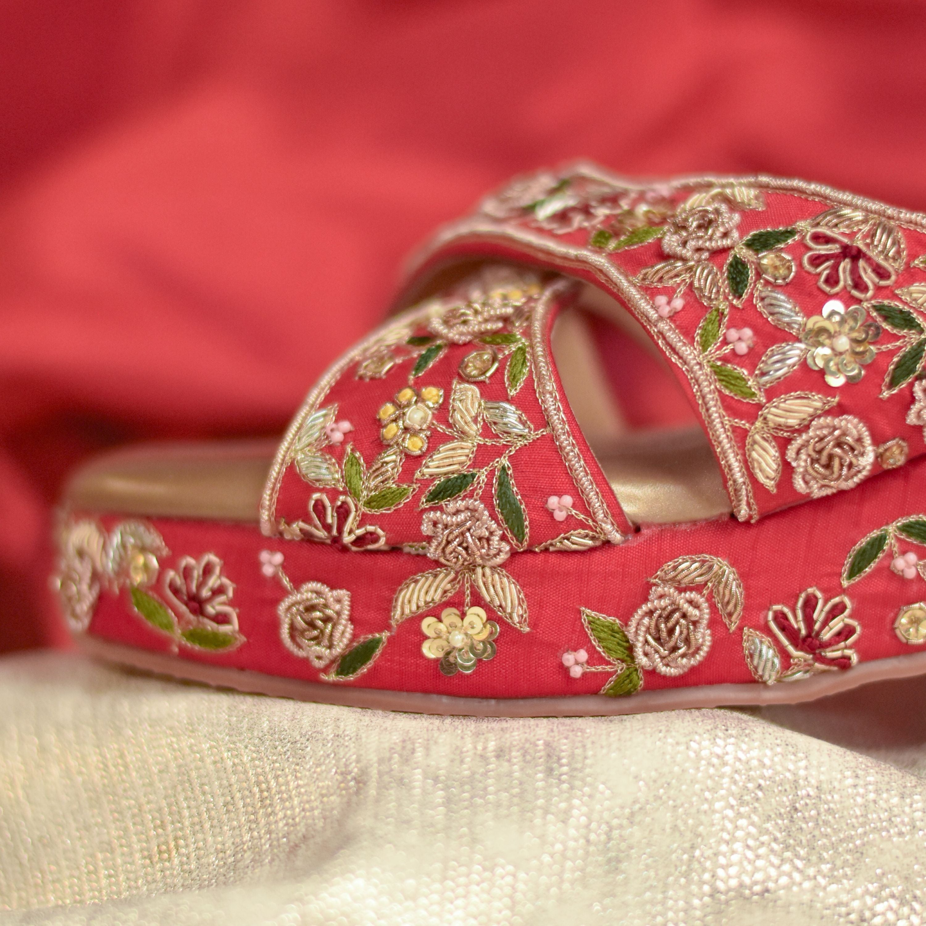 Stylish embroidered wedge for wedding and trousseau wear.