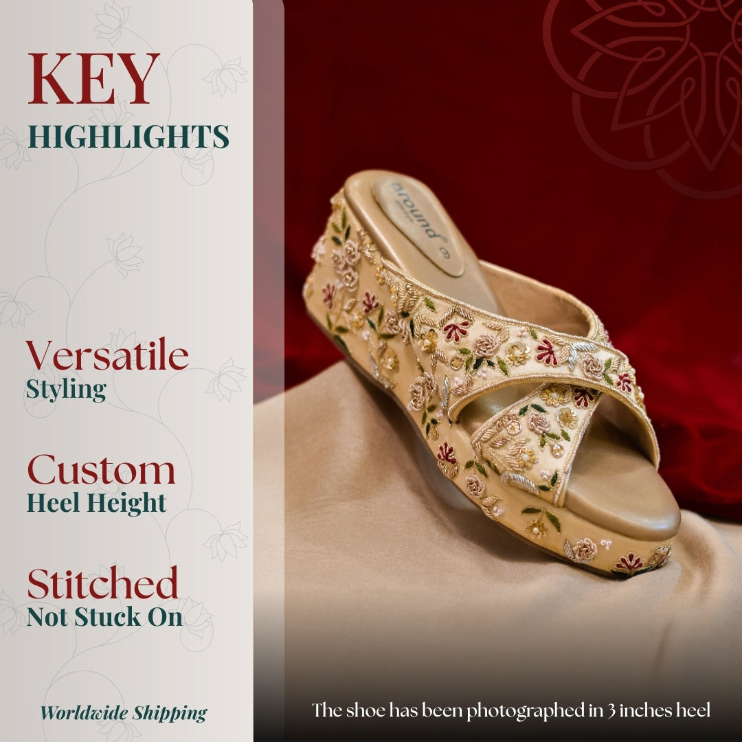 Beige wedge sandal with multicolor floral embroidery and cross straps