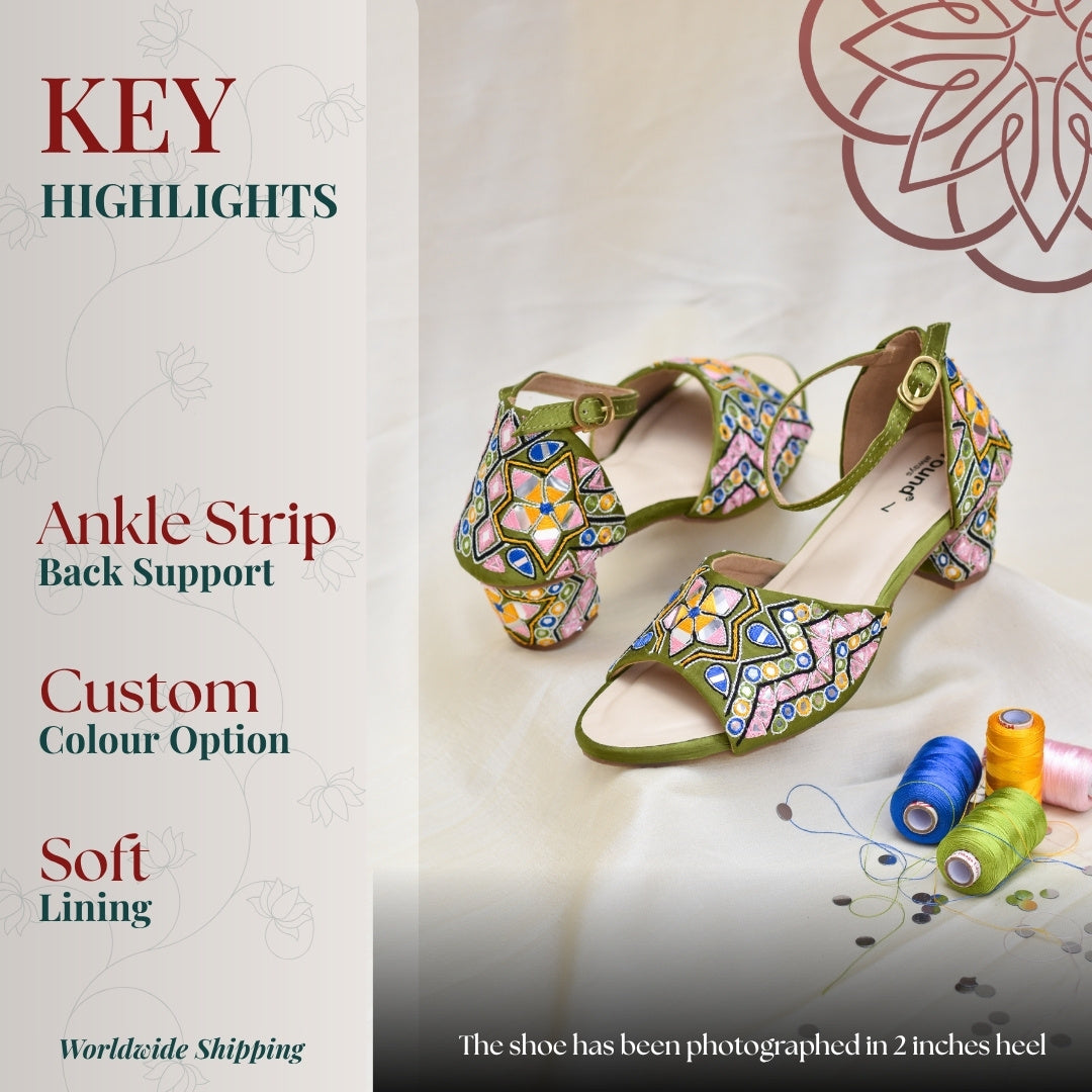 Green block heel sandals with colorful geometric embroidery and ankle strap