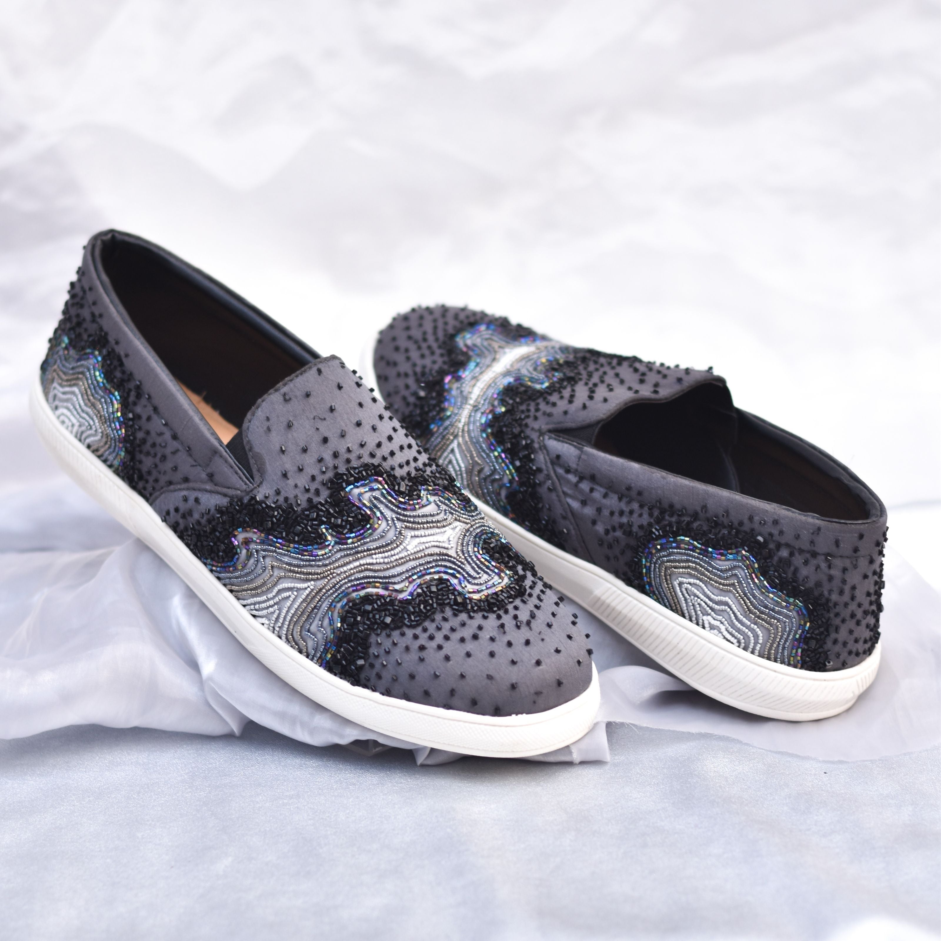 Stylish groom shoes featuring silver beads embroidery and iridescent wave patterns.
