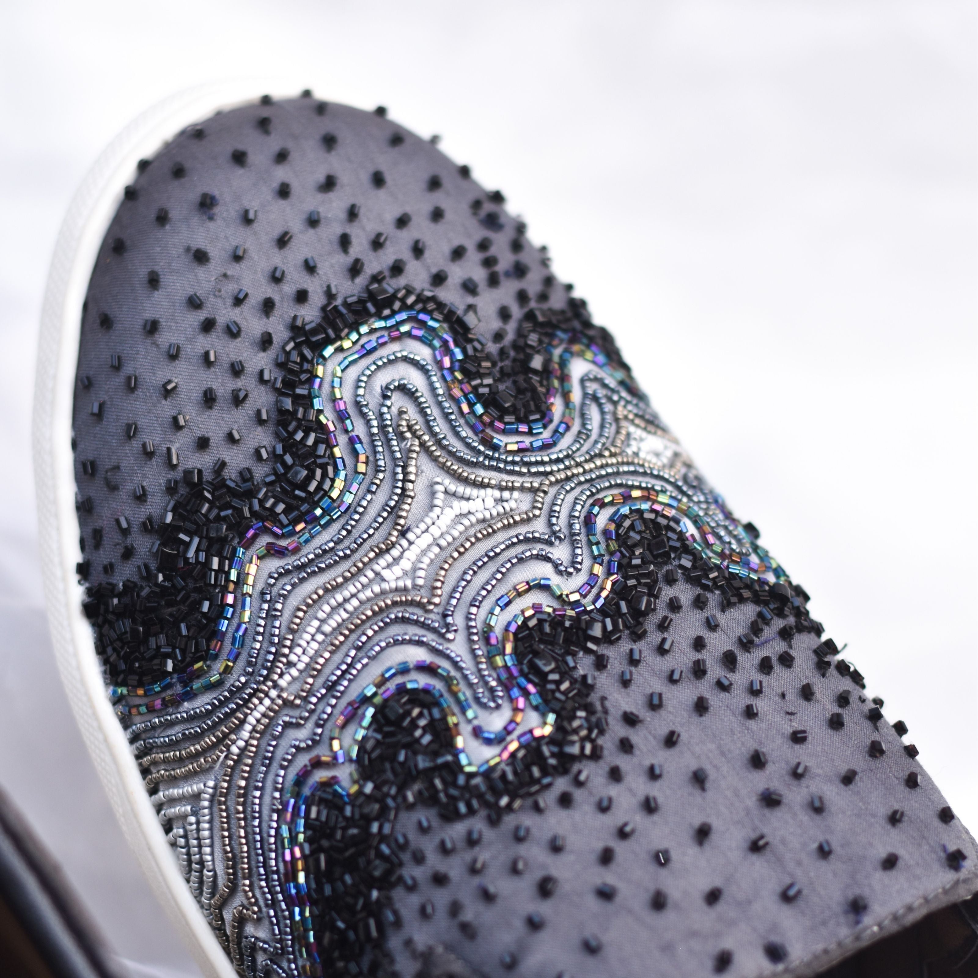 Contemporary wedding footwear with cosmic-inspired design and cushioned sole.
