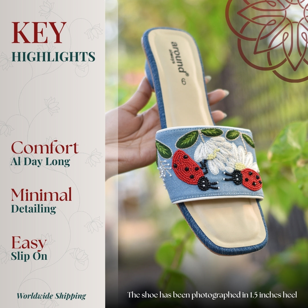 Denim slide sandal with beaded ladybug and floral embroidery