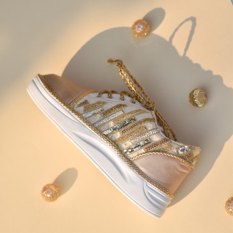 Shiny golden sneakers for brides and bridesmaids