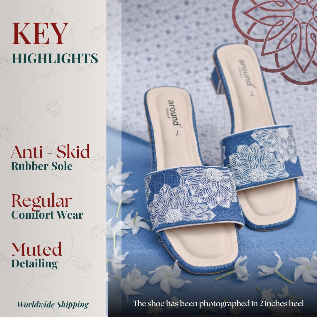 Blue denim slide with white floral embroidery and small moti detailing