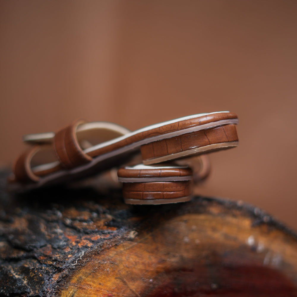 Low heel slider with cream and brown textured upper and modern structured design