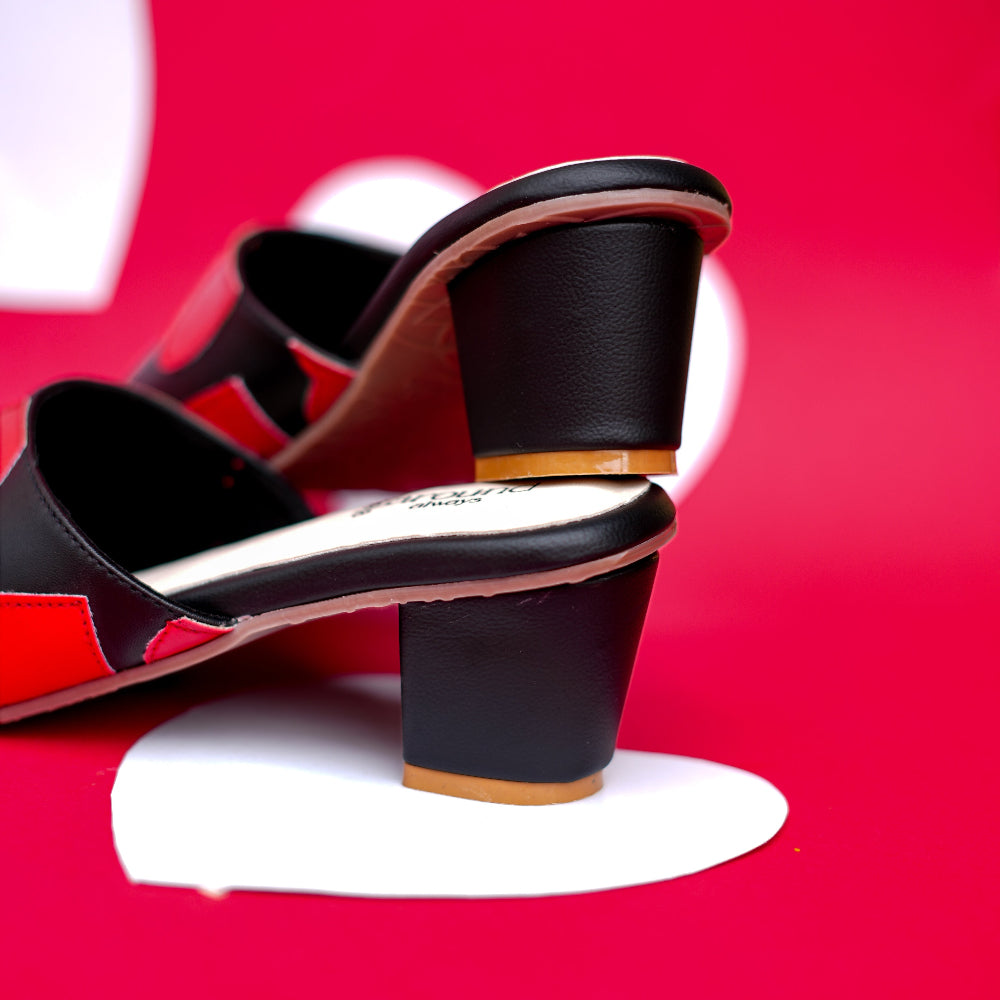 Black occasion mule with contrasting scarlet heart detailing
