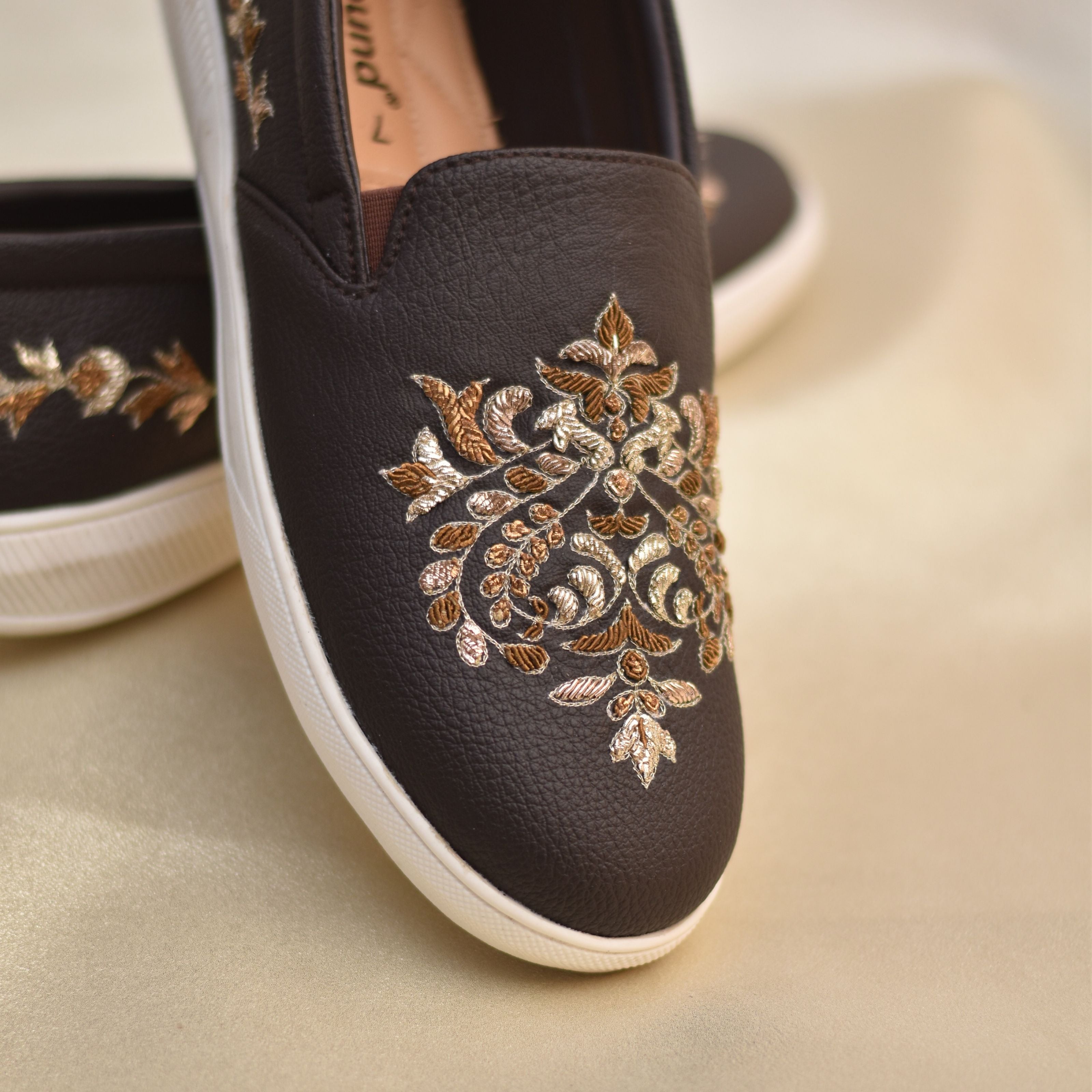 Embellished sneakers in brown and gold tones with cushioned quilted insole