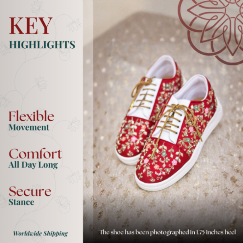 Red embroidered sneakers with gold lace detail and cushioned comfort
