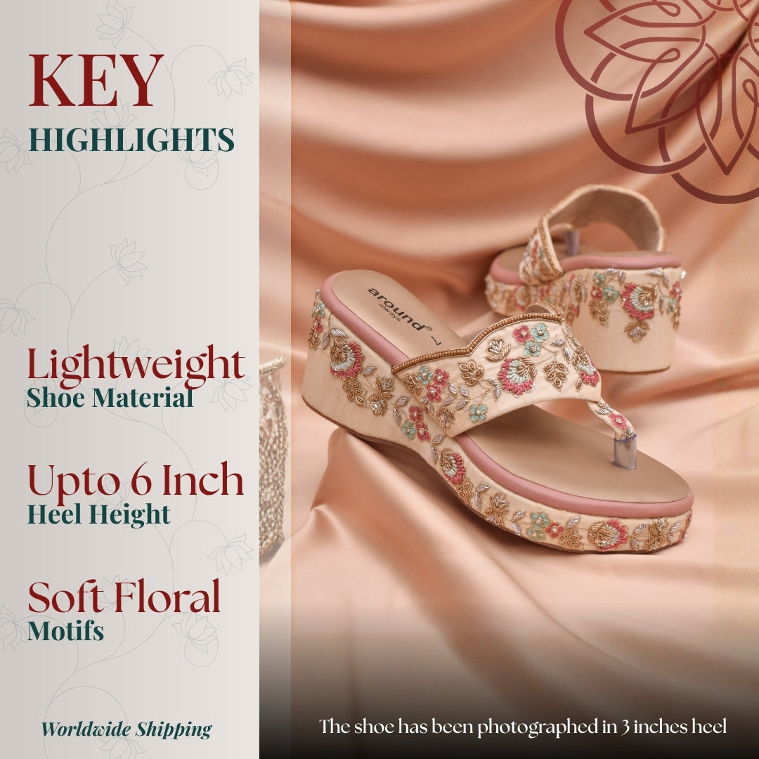 Elegant embroidered wedge heels with pastel floral motifs and cushioned base